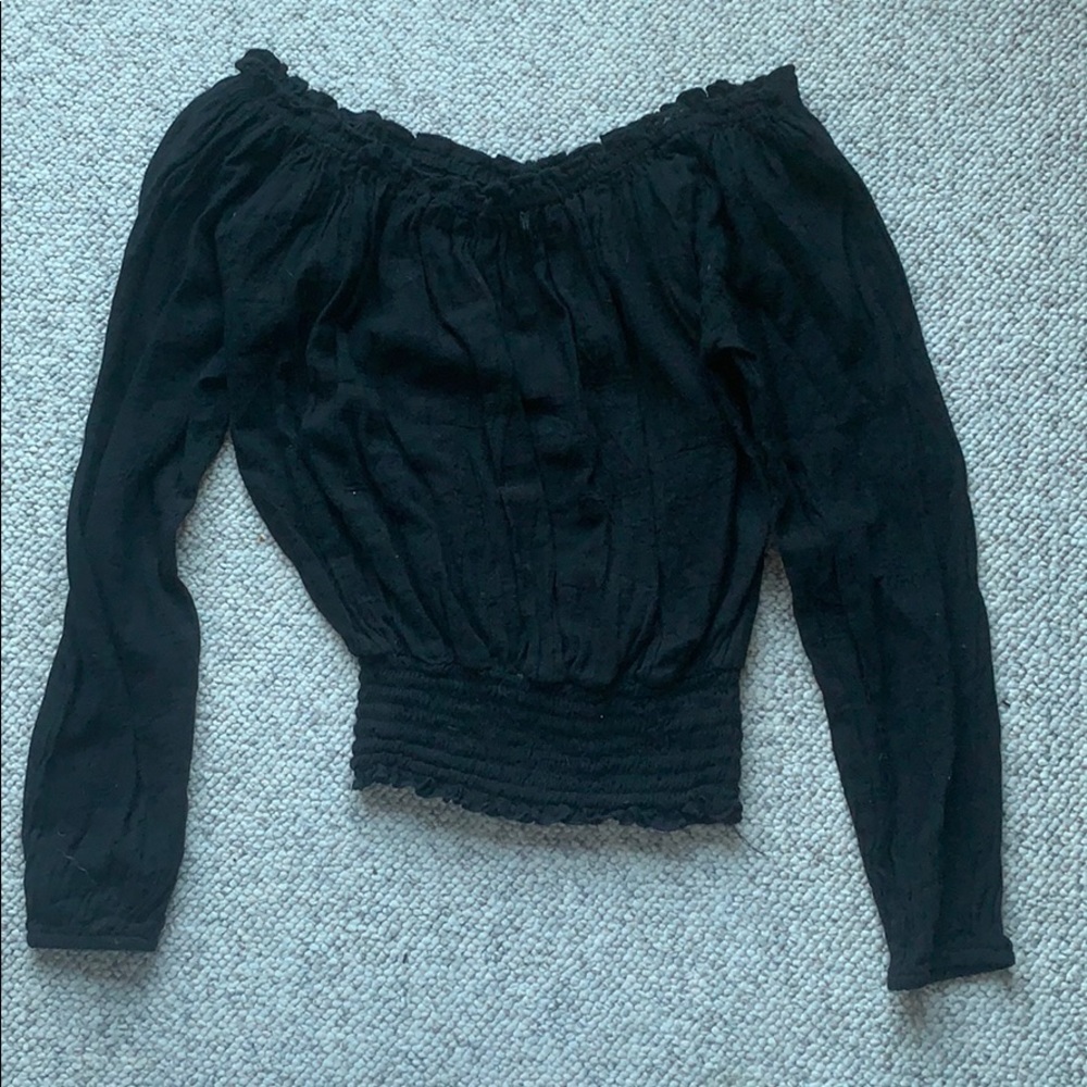 Elan black off the should top